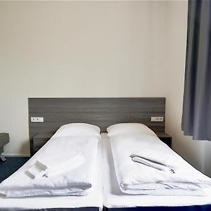 Kleine Kamer met Twee Aparte Bedden